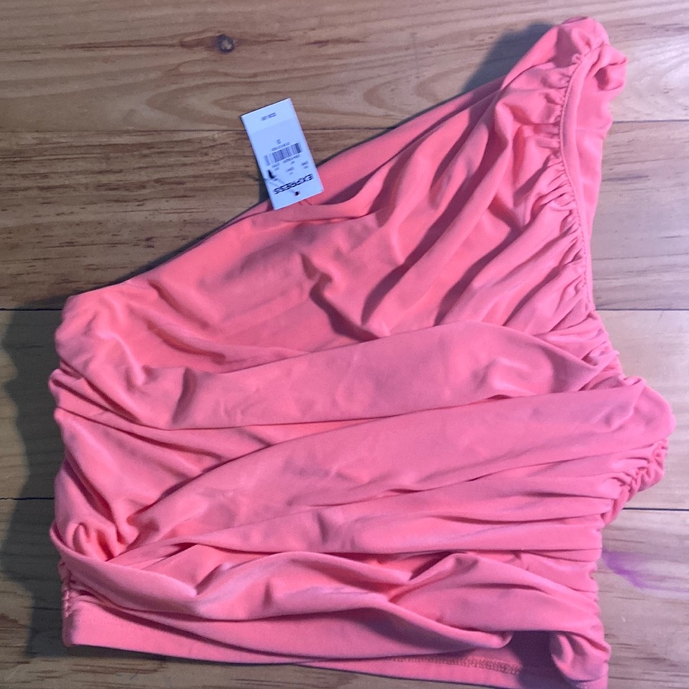 Short, one-sleeve tank from express. Never worn, vibrant coral color.